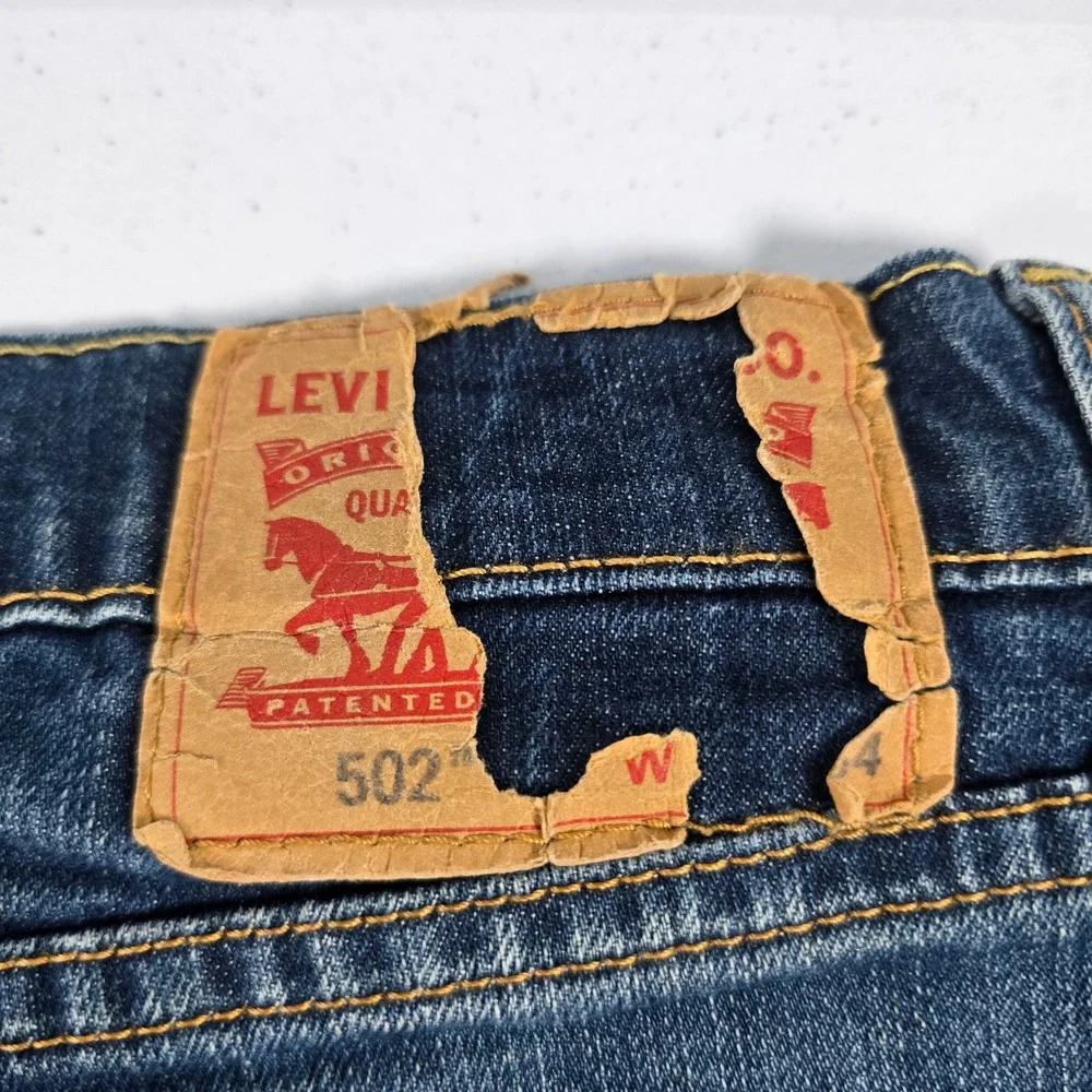 Levis 502 Regular Taper Mens Blue Jeans Medium Wash Stretch 33x34 14376